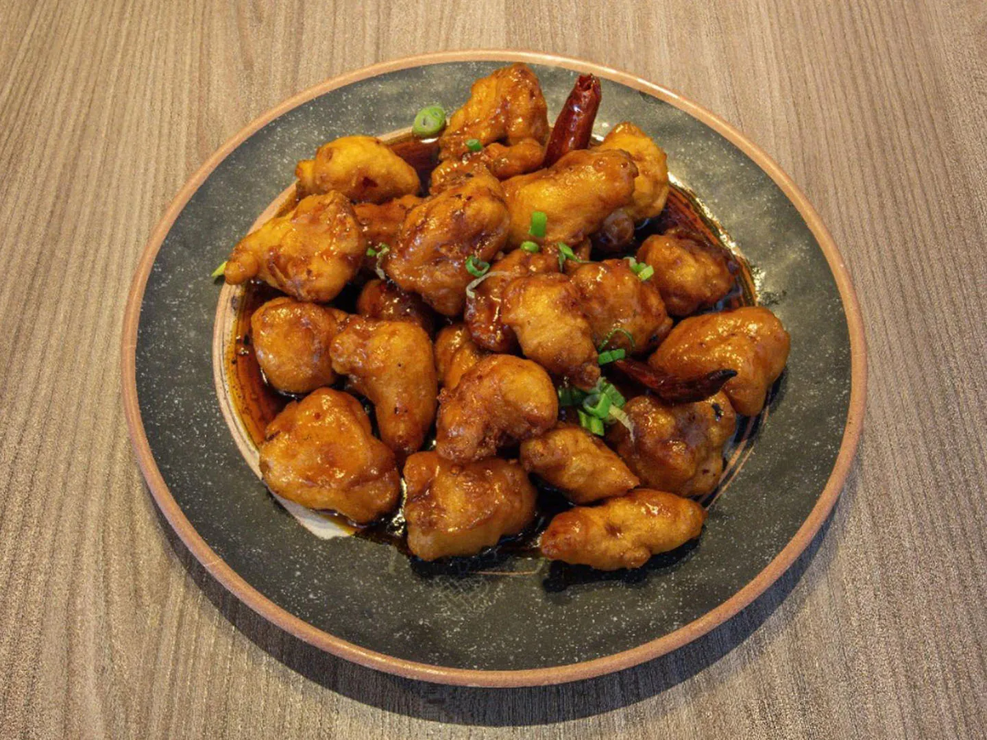 Crispy chicken in sweet-spicy sauce at Uncle Qwik Chinese & Dumpling Restaurant, a Chinese Restaurant in Scottsdale