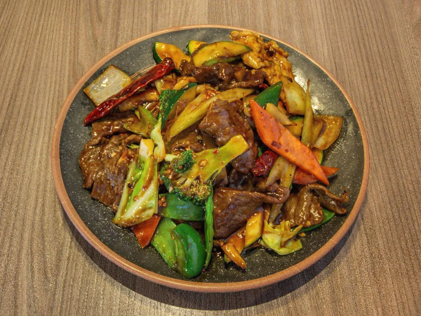 Spicy beef stir-fry with mixed veggies at Uncle Qwik Chinese & Dumpling Restaurant, a Chinese Restaurant in Scottsdale